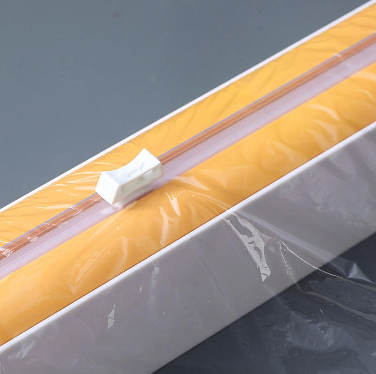 2-in-1 Food Wrap Dispenser & Cutter – Kitchen Cling Film & Foil Storage Organizer